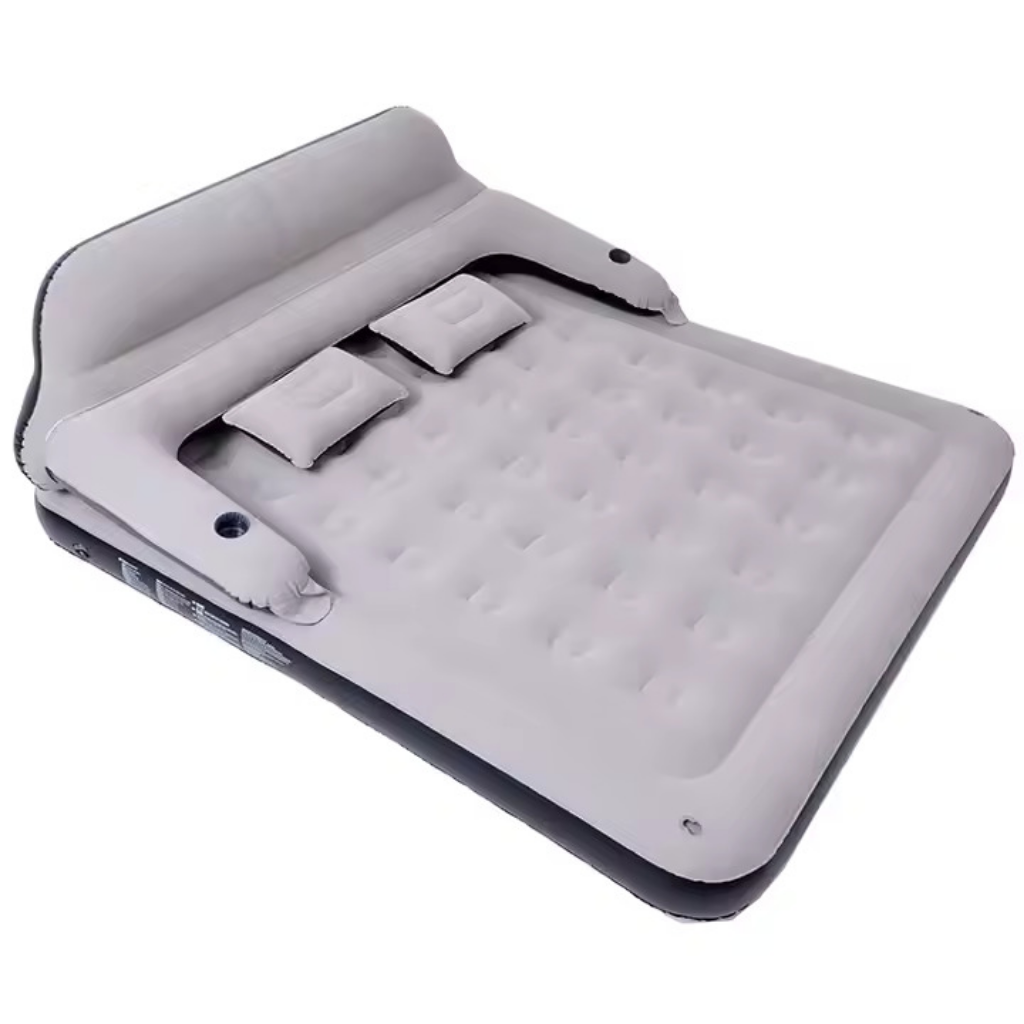 Colchón hinchable gris con respaldo y dos almohadas